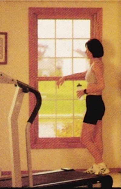 treadmill woman looking out window
